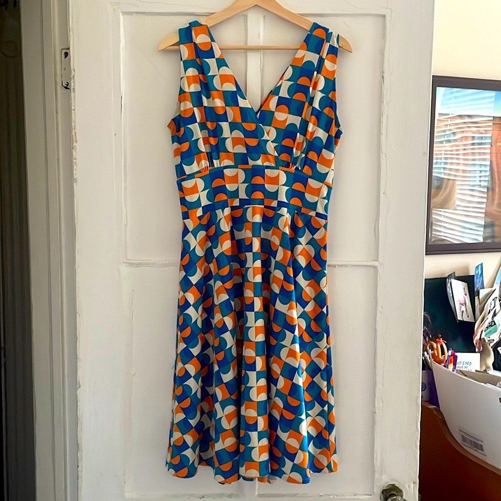 Karina dress. Orange, blue and white geometric pattern. Size M/L.